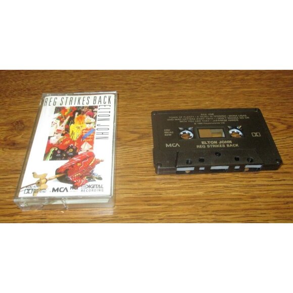 Elton John - Reg Strikes Back on cassette (MCA Records, 1988) - Picture 1 of 4